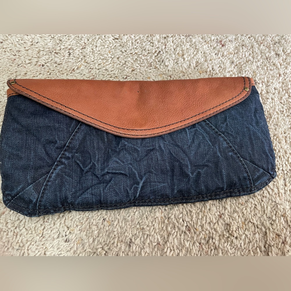 denim/leather clutch from Lucky brand. Size is 6.5 H 12.5 W. Brand new never use